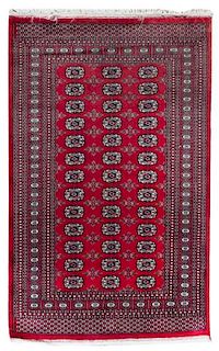 A Turkoman Wool Rug 5 feet 11 inches x 4 feet 2 1/2 inches.