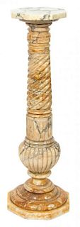 An Italian Carved Alabaster Pedestal Height 43 inches.
