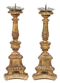 A Pair of Italian Parcel Giltwood Torcheres Height 25 inches.