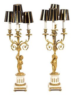 A Pair of Louis XVI Style Gilt Bronze Mounted White Marble Four-Light Candelabra Height overall 32 1/2 inches.
