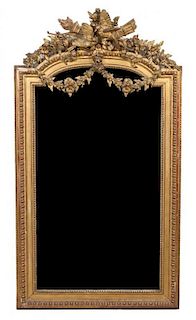 A Louis XVI Carved Giltwood Wedding Mirror Height 64 x width 35 inches.