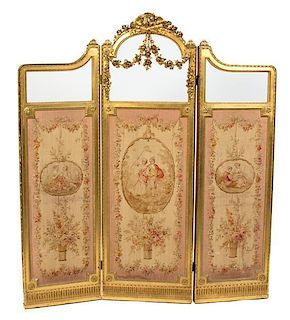 A Louis XVI Style Carved Giltwood Three-Panel Dressing Screen Height 69 1/2 x 18 inches each panel.