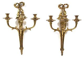 A Pair of Louis XVI Style Gilt Bronze Three-Light Wall Sconces Height 18 inches.