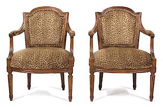 A Pair of Louis XVI Style Fauteuils Height 34 inches.