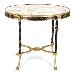 A Neoclassical Style Gilt Bronze Marble Top Oval Side Table Height 23 x length 26 x depth 16 1/2 inches.