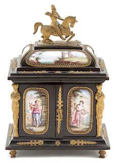 A Renaissance Style Ebonized and Viennese Enameled Miniature Cabinet Height 6 3/4 x width 4 1/2 x depth 3 5/8 inches.