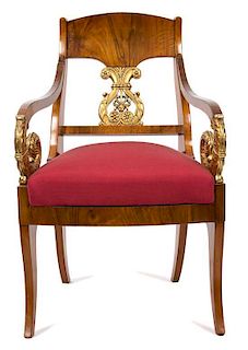 A Continental Empire Style Gilt Walnut Armchair Height 38 inches.