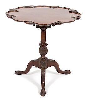 A George II Carved Mahogany Tilt-Top Table