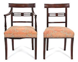 A Set of Twelve Regency Style Mahogany Dining Chairs Height 34 inches.