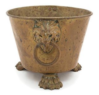 A Regency Style Brass Footed Planter Height 9 1/2 x diameter 12 inches.