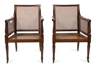 A Pair of William IV Mahogany Cane Back and Seat Armchairs Height 34 inches.