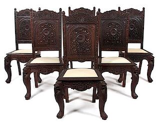A Group of Six Anglo-Indian Carved Tea Side Chairs Height 44 inches.