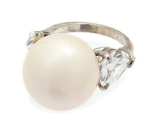A Faux Pearl and Cubic Zirconia Silvertone Ring