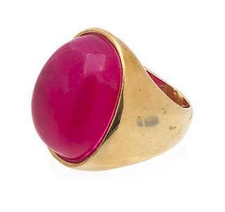 A Pink Cabochon and Goldtone Ring