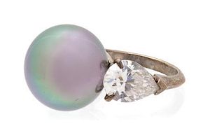 A Faux Tahitian Pearl and Cubic Zirconia Silvertone Ring