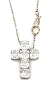A Silvertone and Cubic Zirconia Cross Chain Length of chain 16 1/2 inches.