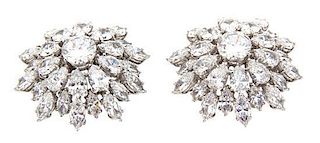 A Pair of Marquise, Pear and Round Cut Pave Brooches Diameter 1 inch.