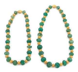 Two Carved Green and Gold Beaded Necklaces Length of longest 26 inches.