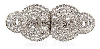 A Silvertone and Cubic Zirconia Convertible Brooch Width 3 3/4 inches.