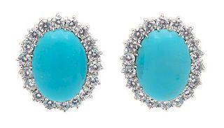 A Pair of Silvertone Faux Turquoise and Cubic Zirconia Earrings Height 1 inch.