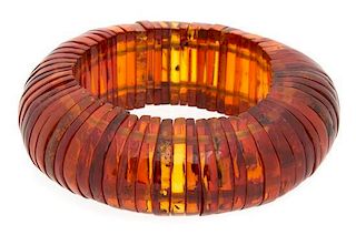 A Group of Faux Amber Diameter of bracelet 3 1/4 inches.