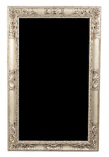 An Italian Carved Silver Gilt Framed Mirror Height 58 3/4 x width 34 inches