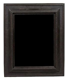 A 17th Century Dutch Style Carved Wood Framed Mirror Height 44 1/2 x width 36 1/2 inches.