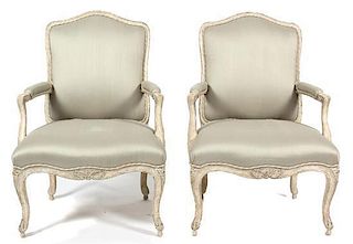 A Pair of Louis XV Style Carved and Painted Fauteuilslate 19th/early 20th centurywith pale green upholstery.Height 41 inches.