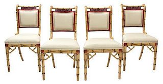A Group of Four Regency Style Painted Faux Bamboo Side Chairs Height 34 inches.
