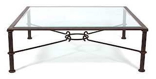 A Contemporary Wrought Iron Occasional Table Height 18 x width 54 x depth 54 inches.