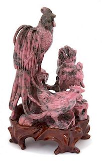 A Chinese Rhodonite Carving of Three Roosters Height 6 1/4 inches.