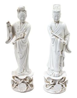 A Pair of Chinese Blanc de Chine Porcelain Figures Height of tallest 20 inches.