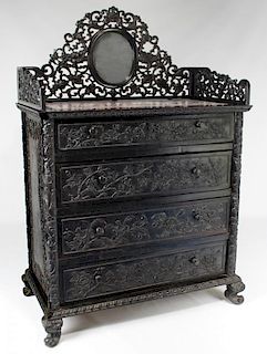ANGLO-INDIAN CARVED EBONY MARBLE-TOP COMMODE
