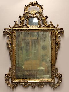 18TH C. ITALIAN CARVED AND GILDED MIRROR