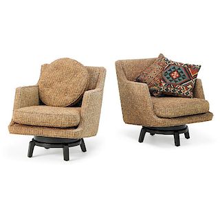 EDWARD WORMLEY Pair of swivel lounge chairs