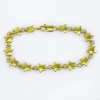 Circa 1980s Tiffany & Co 18 Karat Yellow Gold Stars Bracelet with Box.