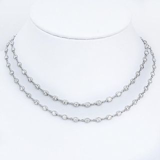 Tiffany style Approx. 7.22 Carat Round Brilliant Cut Diamond and 18 Karat White Gold 32" Long Necklace.