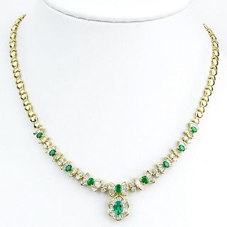 Vintage Approx. 2.20 Carat Baguette and Round Brilliant Cut Diamond, Oval Cut Emerald and 14 Karat Yellow Gold Pendant Neckla