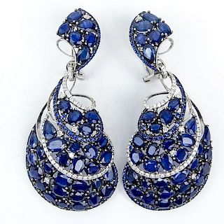 Approx. 40.0 Carat Pear Shape, Oval and Round Cut Sapphire and 18 Karat White Gold Earrings accented with approx. 1.20 Carat 