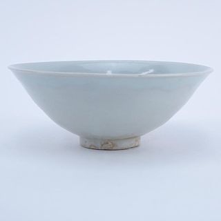 Chinese Song Dynasty (1127–1279) Oingbai Ware Bowl. a bowl with freely combed wavy lines in the interior covered with pale 
