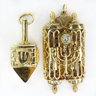 Vintage 14 Karat Yellow Gold Dreidel Pendant and 14 Karat Yellow Gold Torah Pendant with Diamond Accent.