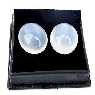 Two (2) Gem Quality Oval Cabochon Moonstones, Approx. 20.80 Carats TW. Very strong cat's eye effect, VVS1 clarity.