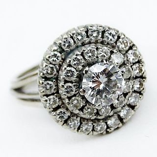 Vintage Round Brilliant Cut Diamond and 14 Karat White Gold Starburst Ring.