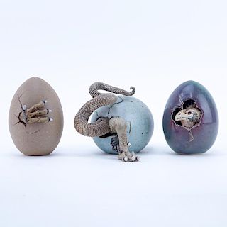 Three (3) Dennis Thompson Hatching Dragon Egg Sculptures.