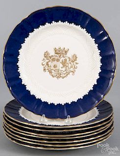 Set of eight Mason's Ironstone plates with central gilt armorial and blue border, 10 1/4'' dia.