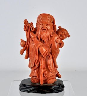 Chinese Carved Coral Figurine on Wood Base