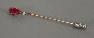 Gold stick pin, set with teardrop ruby and small diamond.