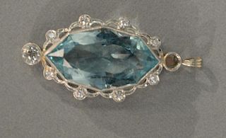 White gold pendant, set with large marquis aquamarine with eight diamonds, one diamond is loose but available. total weight 8