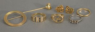 14K gold lot with two rings, one set with diamonds and sapphires, a circular pin, pair of earrings, and stick pin. 3.2 grams