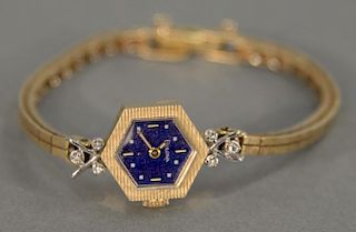 Bulova women's 14 karat gold wrist watch. Total weight 12.7 grams